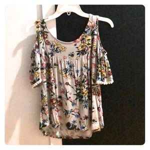 A shoulder cut out floral blouse
